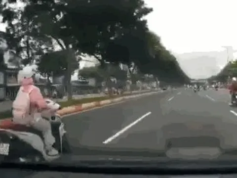 "Cô gái chạy xe máy tạt đầu ôtô trên đường Phạm Văn Đồng" là ai?
