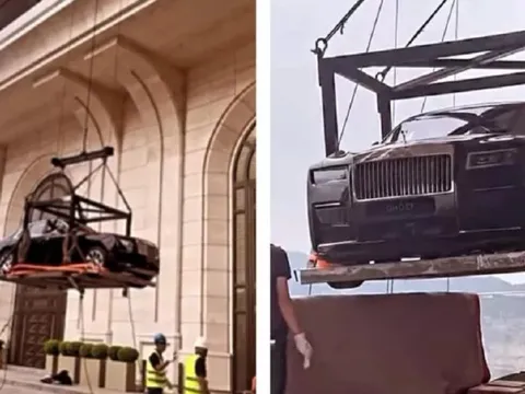 Thú chơi độc lạ của đại gia: Cẩu Rolls-Royce lên penthouse tầng 44, đặt ngoài ban công chỉ để trang trí