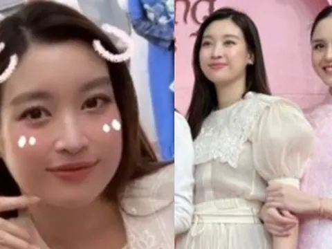 Hoa hậu Đỗ Mỹ Linh lên đồ dự đám cưới hậu sinh nở, sắc vóc qua "cam thường" thế nào?
