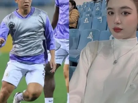 Vợ trung vệ U23 Việt Nam xinh như búp bê trên khán đài sân Mỹ Đình