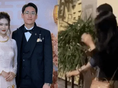 Bắt gặp hotgirl ngân hàng đứng chờ trung vệ U23 Việt Nam, ngại ngùng giấu mặt khi thấy cam của team qua đường
