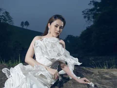 Hoa hậu Lý Kim Thảo dầm mưa để quay clip quảng bá du lịch tỉnh Phú Thọ