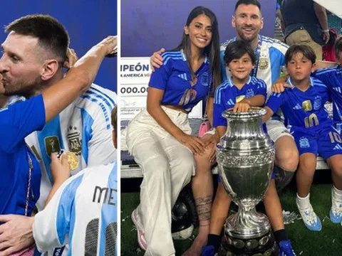 Messi khoá môi bà xã Antonella đầy ngọt ngào, cùng 3 quý tử được dàn vệ sĩ hùng hậu bảo vệ rời đi sau chức vô địch Copa America